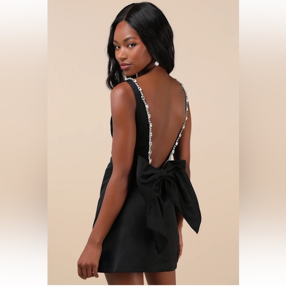 Lulu’s Cloe Black Rhinestone Backless
Bow Mini Dress
The Frolic - Picture 2 of 4